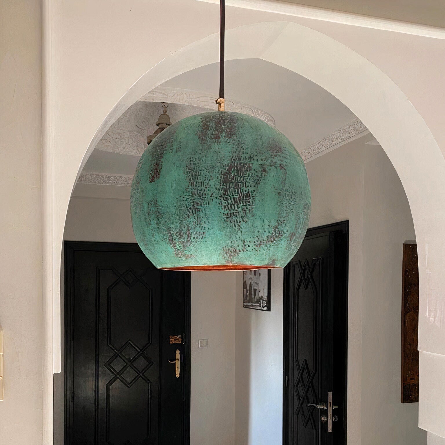 Hammered copper pendant light
